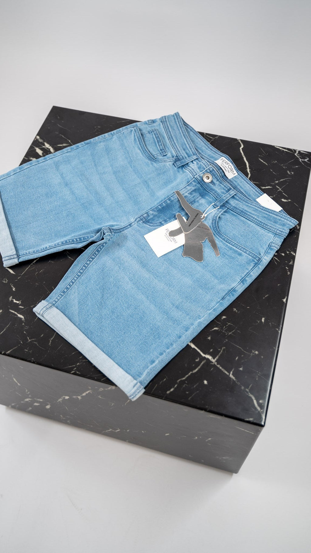 Le short denim de performances d'origine - Bleu clair